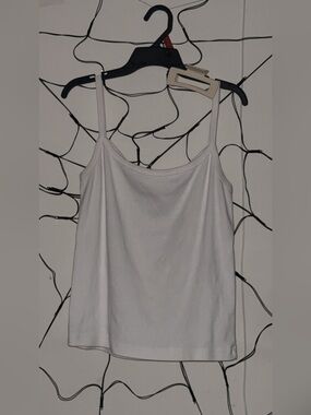 White tank top with claw clip :)